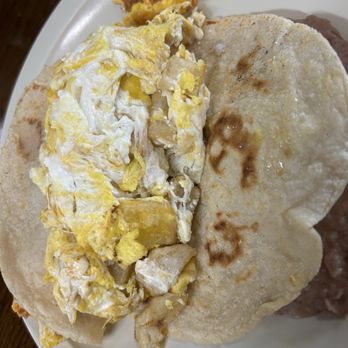 Mundy's Tamale' & Grill - Potato and egg corn tortilla taco - Breakfast & Brunch Near Me - Pharr, Texas Mundy's Tamale' & Grill - Potato and egg corn tortilla taco - Breakfast & Brunch Near Me - Pharr, Texas