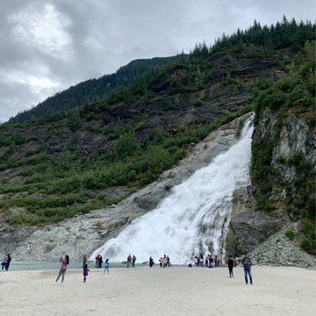 Nugget Falls - Nugget Falls sits on the beach shore around the corner from Mendenhall Glacier. - Hiking Near Me Nugget Falls - Nugget Falls sits on the beach shore around the corner from Mendenhall Glacier. - Hiking Near Me
