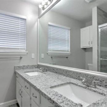 LegacyTec Roofing & Construction - a bathroom with granite countertops - Roofing Near Me LegacyTec Roofing & Construction - a bathroom with granite countertops - Roofing Near Me