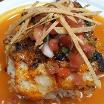 Chichen Itza Restaurant - Tikin-Xic (fish in achiote sauce) - Close up - Mexican Near Me - Los Angeles, California Chichen Itza Restaurant - Tikin-Xic (fish in achiote sauce) - Close up - Mexican Near Me - Los Angeles, California