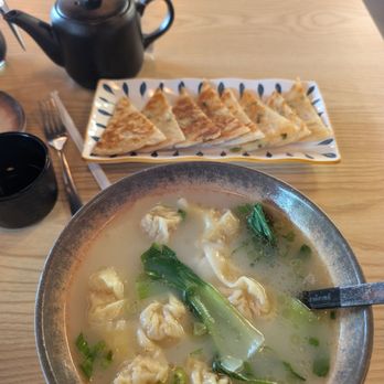 Dumpling Empire - Beef clear soup, scallions bread and pan fried dumplings. Yummy - Dim Sum Near Me - Omaha, Nebraska