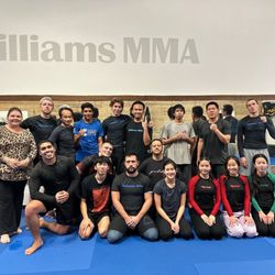 Williams MMA class with my friend brandenn and everyone at the MMa class .