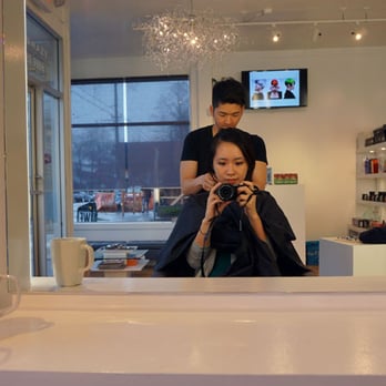Salon Haze - Tim Kuo concentrating on my hair - Hair Salons Near Me - Vancouver, British Columbia