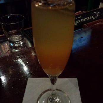 Capers - Bellini (wine + peach schnapps+ peach puree) - Bars Near Me - Kennesaw, Georgia