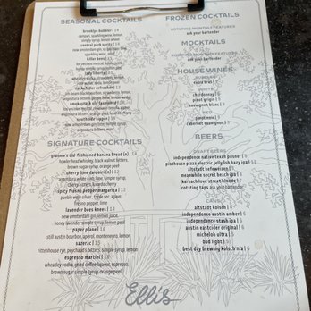 Ellis - Menu - The menu from Ellis restaurant is printed on white paper with black text, divided into sections for various beverages including cocktails, mocktails, house wines, beers, and signature cocktails. The menu features detailed descriptions of each drink, with some sections indicating rotating features and bartender recommendations. The menu is attached to a clipboard and has a decorative illustration of grass and plants at the bottom, with the restaurant's name, Ellis, prominently displayed. - Bars Near Me - Austin, Texas