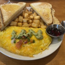Southwest omelette, home fries, white toast Southwest omelette, home fries, white toast