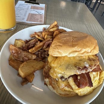 Our Nest - This Bacon,Sausage, and egg sandwich was delicious. Tasted as good as it looked - Breakfast & Brunch Near Me - Fullerton, California Our Nest - This Bacon,Sausage, and egg sandwich was delicious. Tasted as good as it looked - Breakfast & Brunch Near Me - Fullerton, California