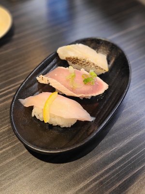 Kura Revolving Sushi Bar by null