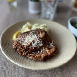 THE LOT City Center - $34 Chicken Schnitzel- one small piece sitting on dried up mashed potatoes. Just looking sad.