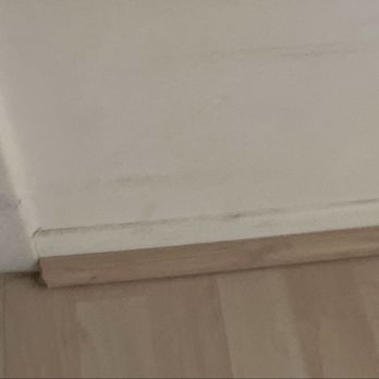 Watts Us Work - Baseboard by front door. - Home Cleaning Near Me Watts Us Work - Baseboard by front door. - Home Cleaning Near Me