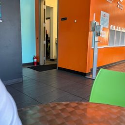 The workers cussing and not doing anything.