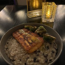 Salmon with black bean risotto