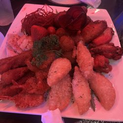 Utopia Kitchen And Lounge - Appetizer platter delish!! Empanadas, croquettes, shrimp, quesadillas and more!!