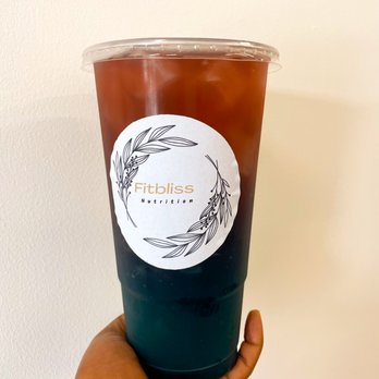 FitBliss Nutrition - a hand holding a cup of iced tea - Coffee & Tea Near Me - Surf City, North Carolina FitBliss Nutrition - a hand holding a cup of iced tea - Coffee & Tea Near Me - Surf City, North Carolina