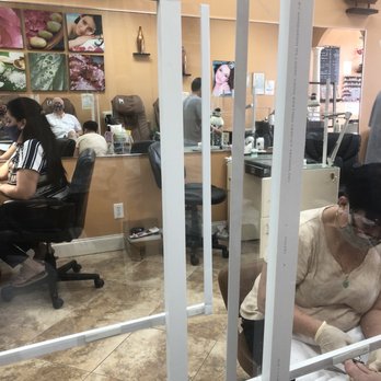 NQ Nails - Shields in front of each pedicure station... - Nail Salons Near Me - Greenacres, Florida