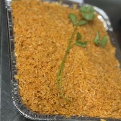 Taco Lady - Spanish rice no veggies in it.
