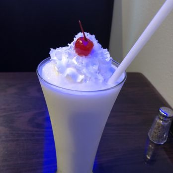 Mojitos Mexican Grill - a glass of milkshake with a cherry on top - Mexican Near Me - Fayetteville, Arkansas Mojitos Mexican Grill - a glass of milkshake with a cherry on top - Mexican Near Me - Fayetteville, Arkansas