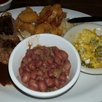 Cheddar's Scratch Kitchen - Top sirloin with fried shrimp on a bed of rice served with brocolli cheese casserole and red beans and rice. Overall very good dish. - American Near Me - Laredo, Texas