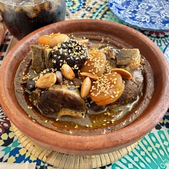 El Fassi Cuisine - Lamb tajine with almonds, prunes and apricots in a savory sauce. - Moroccan Near Me - Boynton Beach, Florida