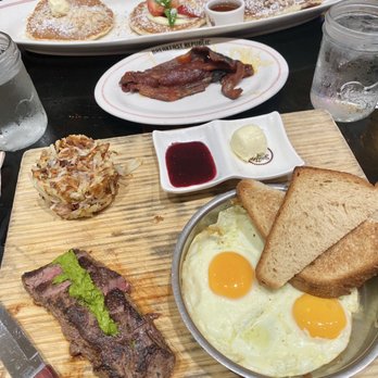 Breakfast Republic - *Steak and Eggs* *Flight of 3 (strawberry cheesecake, cinnamon roll, and lemon coconut)* *Jurassic Pork* - Breakfast & Brunch Near Me - Irvine, California