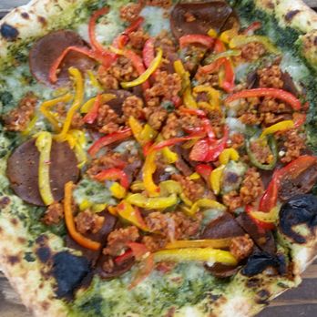 Floralia - Switched out the red sauce for pesto. Vegan sausage and pepperoni. Great pizza! Very pleased. - Italian Near Me - Honolulu, Hawaii Floralia - Switched out the red sauce for pesto. Vegan sausage and pepperoni. Great pizza! Very pleased. - Italian Near Me - Honolulu, Hawaii