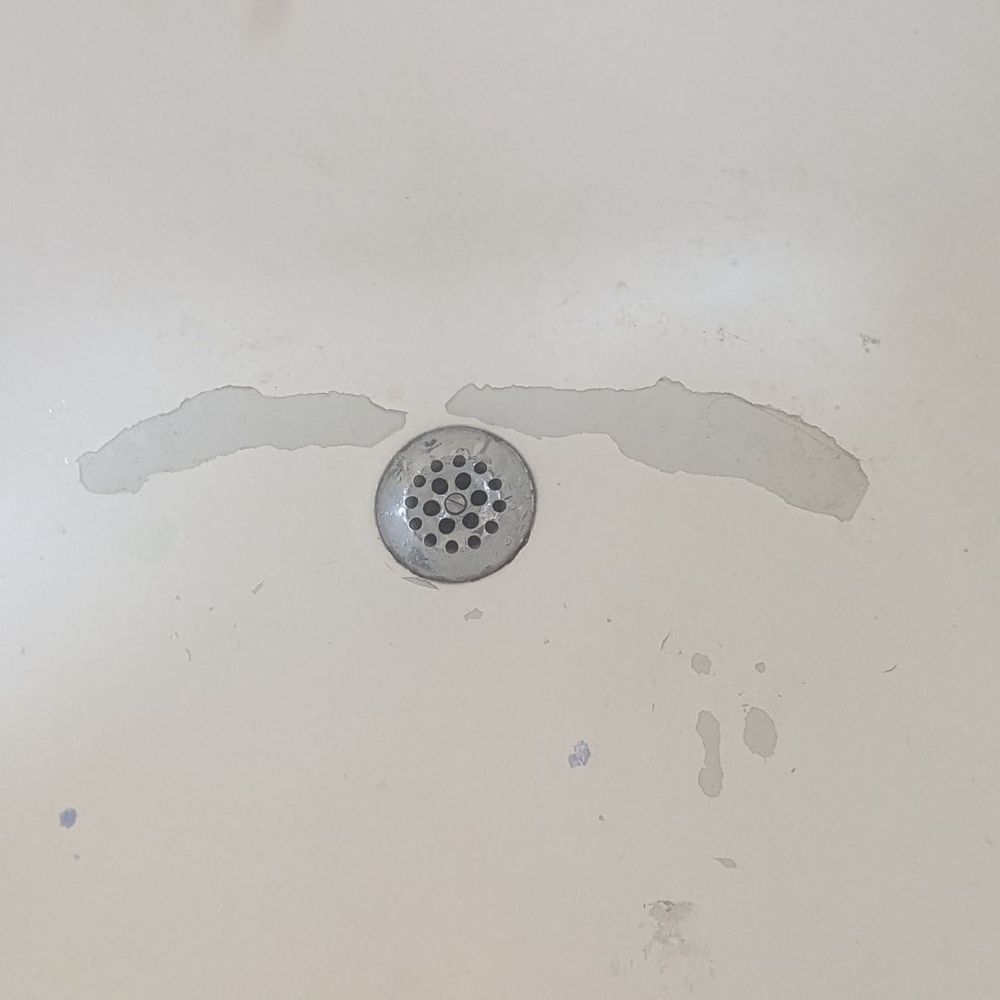 Simply Reglaze - Pics of the peeling enamel in the bathtub before Simply Reglaze worked their magic - Refinishing Services Near Me - Anaheim, California