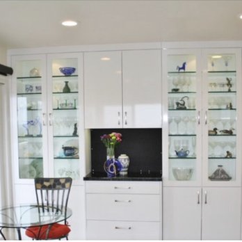 DD Build Construction - a kitchen with glass cabinets - General Contractors Near Me