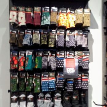 5.11 Tactical - My favorite part of the store, SOCKS.  Great selection. - Wall-mounted rack with multiple rows of patterned socks, including holiday, camouflage, and novelty designs, at 5.11 Tactical in Albuquerque. - Outdoor Gear Near Me - Albuquerque, New Mexico