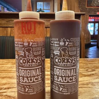 Corky's BBQ - 2 Sauces on the table , but they have 2 others if you ask - Barbeque Near Me - Cordova, Tennessee