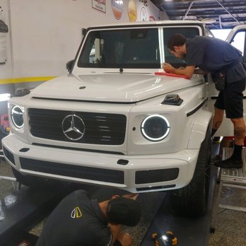 Ultimate Shield - Custom clear bra and tint being installed on new G wagon - Auto Detailing Near Me - Orange, California Ultimate Shield - Custom clear bra and tint being installed on new G wagon - Auto Detailing Near Me - Orange, California