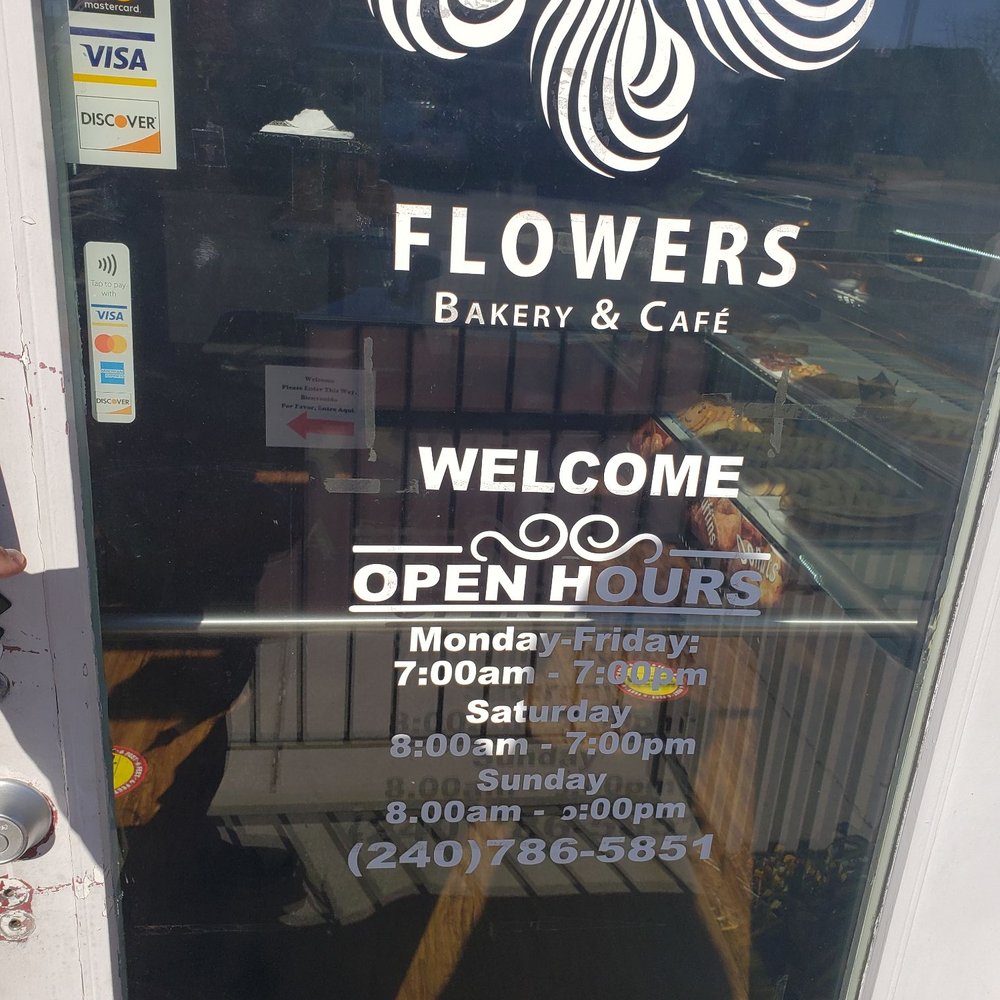 Flowers Bakery Laurel - Door with hours and phone number - Bakeries Near Me - Laurel, Maryland