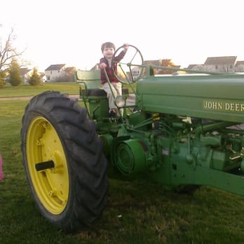 Homestead Park - A big antique tractor for kids to climb and play on at Homestead Park. - Parks Near Me - Hilliard, Ohio Homestead Park - A big antique tractor for kids to climb and play on at Homestead Park. - Parks Near Me - Hilliard, Ohio