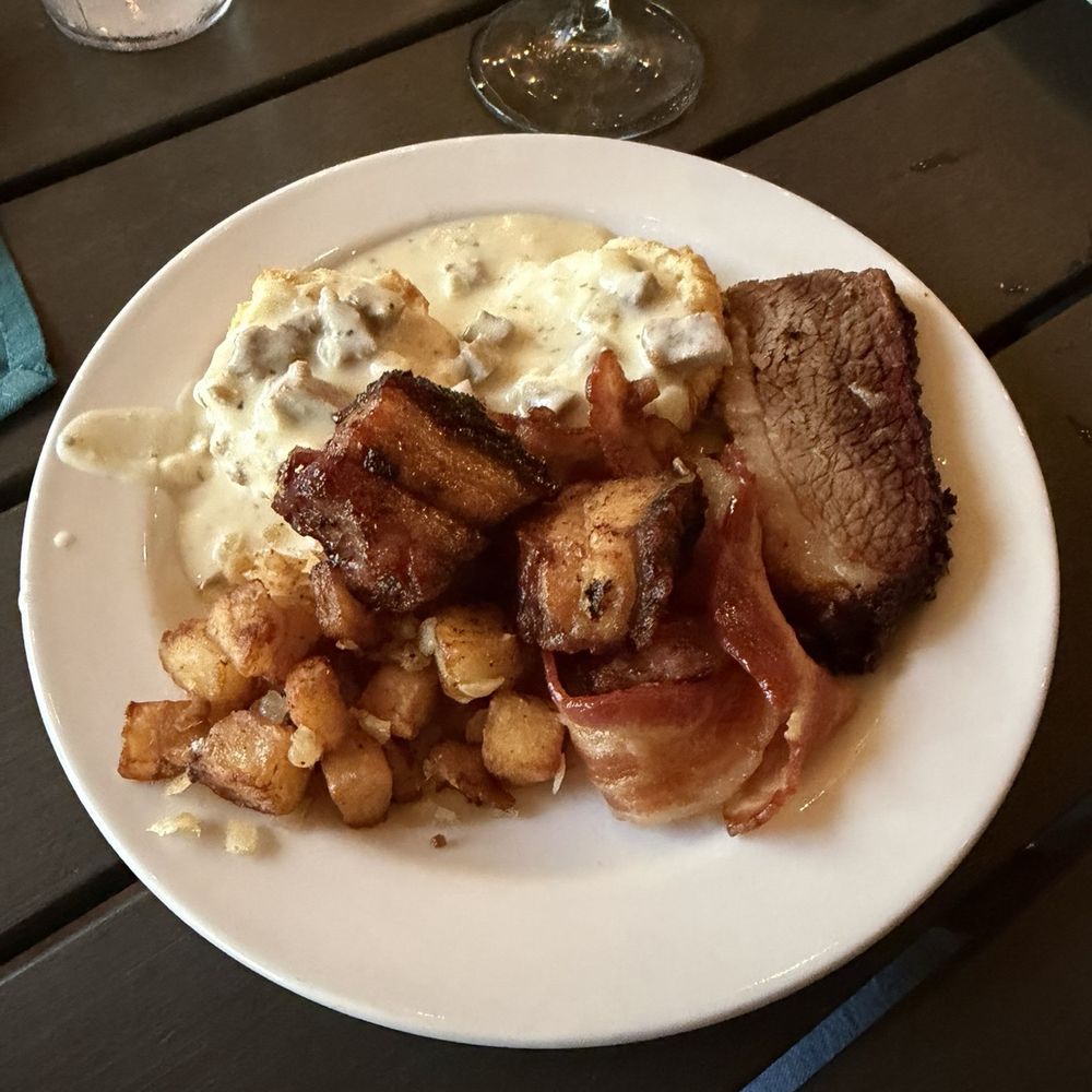 Palmettos on the Bayou - Brunch Buffet - Breakfast potatoes, brisket, pork belly, bacon, and biscuits and gravy. - Cajun/Creole Near Me - Slidell, Louisiana
