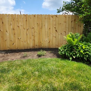 Lees Hands - a wooden fence in a backyard - Handyman Near Me