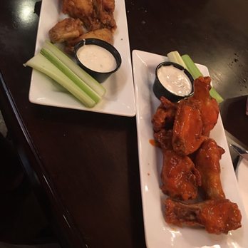 Grumpy's Too - two plates of wings and celery - American Near Me - Little Rock, Arkansas Grumpy's Too - two plates of wings and celery - American Near Me - Little Rock, Arkansas