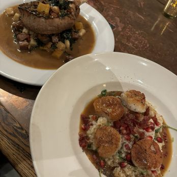 Wood Tavern - Grilled Double Cut Pork Chop and Seared Day Boat Scallops - New American Near Me - Oakland, California Wood Tavern - Grilled Double Cut Pork Chop and Seared Day Boat Scallops - New American Near Me - Oakland, California