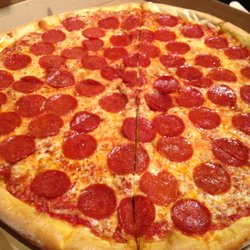 Gino's Pizza - Their party pizza is awesome .....