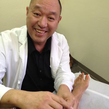 Robert Chu Acupuncture and Herbal Therapy - In the clinic, treating. - Acupuncture Near Me - Pasadena, California Robert Chu Acupuncture and Herbal Therapy - In the clinic, treating. - Acupuncture Near Me - Pasadena, California