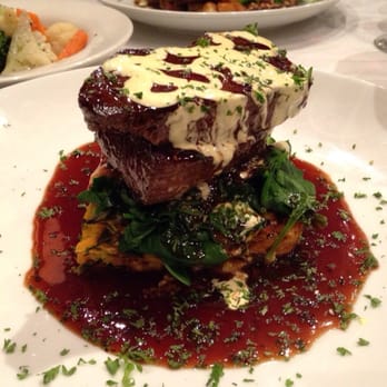 Buffalo Bar & Grill - Kangaroo fillet with vegetable gratin, wilted spinach, eggplant purée and a beef-wine au jus. - Bars Near Me - Auckland, AUK Buffalo Bar & Grill - Kangaroo fillet with vegetable gratin, wilted spinach, eggplant purée and a beef-wine au jus. - Bars Near Me - Auckland, AUK