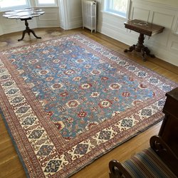 Jafri Oriental Rugs - Beautiful Kazak design in place in the dining room