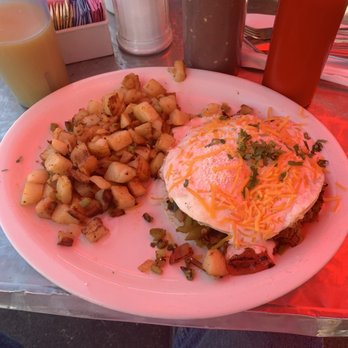 Nick's Cafe - Huevos rancheros.... there's meat under that egg... delicious... I will be back - Diners Near Me - Los Angeles, California