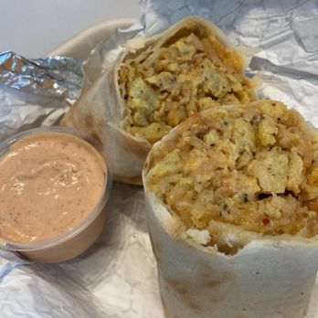 Trident Coffee - GF breakfast burrito - eggs, sausage, hashbrowns, cheese, rice, sriracha aioli - Coffee & Tea Near Me - San Diego, California Trident Coffee - GF breakfast burrito - eggs, sausage, hashbrowns, cheese, rice, sriracha aioli - Coffee & Tea Near Me - San Diego, California