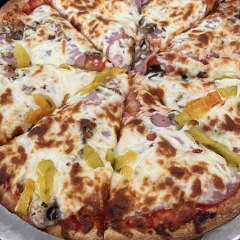 Turning Point Restaurant - Customized Pizza - mushroom, canadian bacon and banana peppers - Pizza Near Me - Golden, British Columbia Turning Point Restaurant - Customized Pizza - mushroom, canadian bacon and banana peppers - Pizza Near Me - Golden, British Columbia