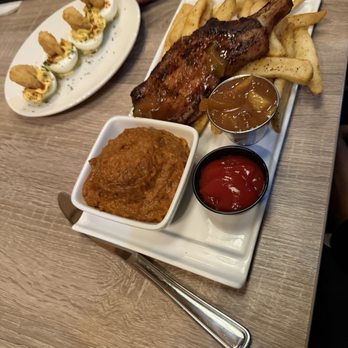 Sweet Georgia's Juke Joint - Deviled eggs with fried shrimp Grilled Pork Chop Steak Fries Sweet Potatoes - Southern Near Me - Atlanta, Georgia Sweet Georgia's Juke Joint - Deviled eggs with fried shrimp Grilled Pork Chop Steak Fries Sweet Potatoes - Southern Near Me - Atlanta, Georgia