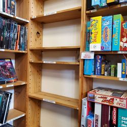 Half Price Books - Empty used boardgame shelves. Hope more come in soon!