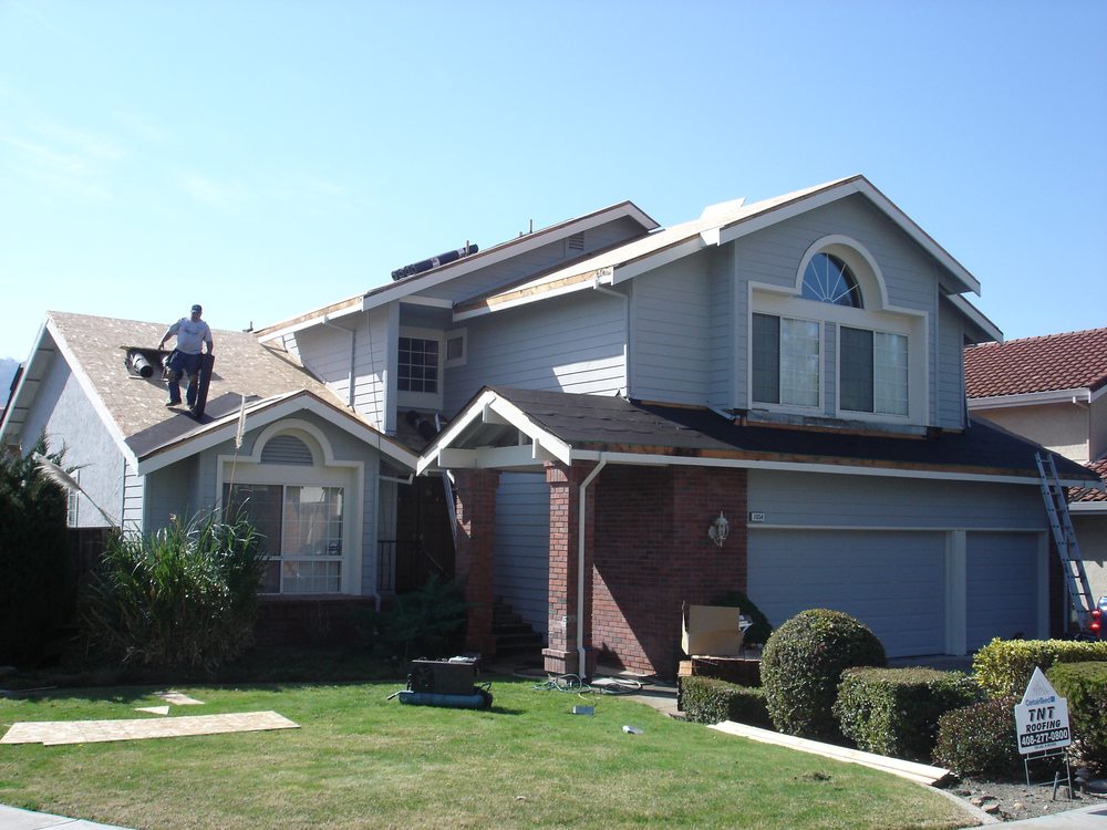 Slide of TNT Roofing