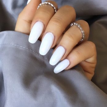 Creative Nails - Cross between coffin and almond. I call it rounded coffin. White is so much fun! Probably my favorite by far. I got so many compliments! - Nail Salons Near Me - Las Vegas, Nevada Creative Nails - Cross between coffin and almond. I call it rounded coffin. White is so much fun! Probably my favorite by far. I got so many compliments! - Nail Salons Near Me - Las Vegas, Nevada