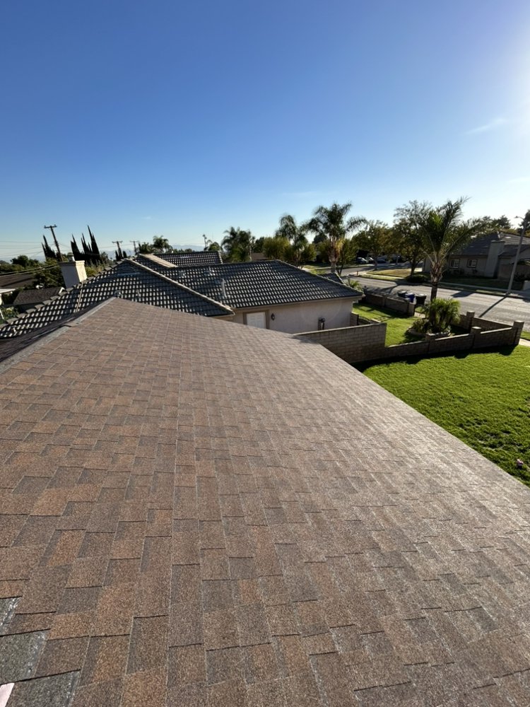 Slide of Blue J’s Roofing