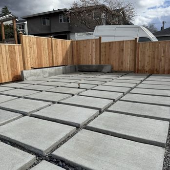 Apple's Construction - Concrete patio with black pebbles - Masonry/Concrete Near Me Apple's Construction - Concrete patio with black pebbles - Masonry/Concrete Near Me