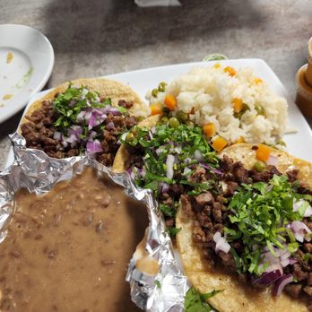 Mariscos El Oceano - 3 steak taco dinner with cilantro and onion plus rice and beans.  Wonderful - Seafood Near Me - Chicago, Illinois